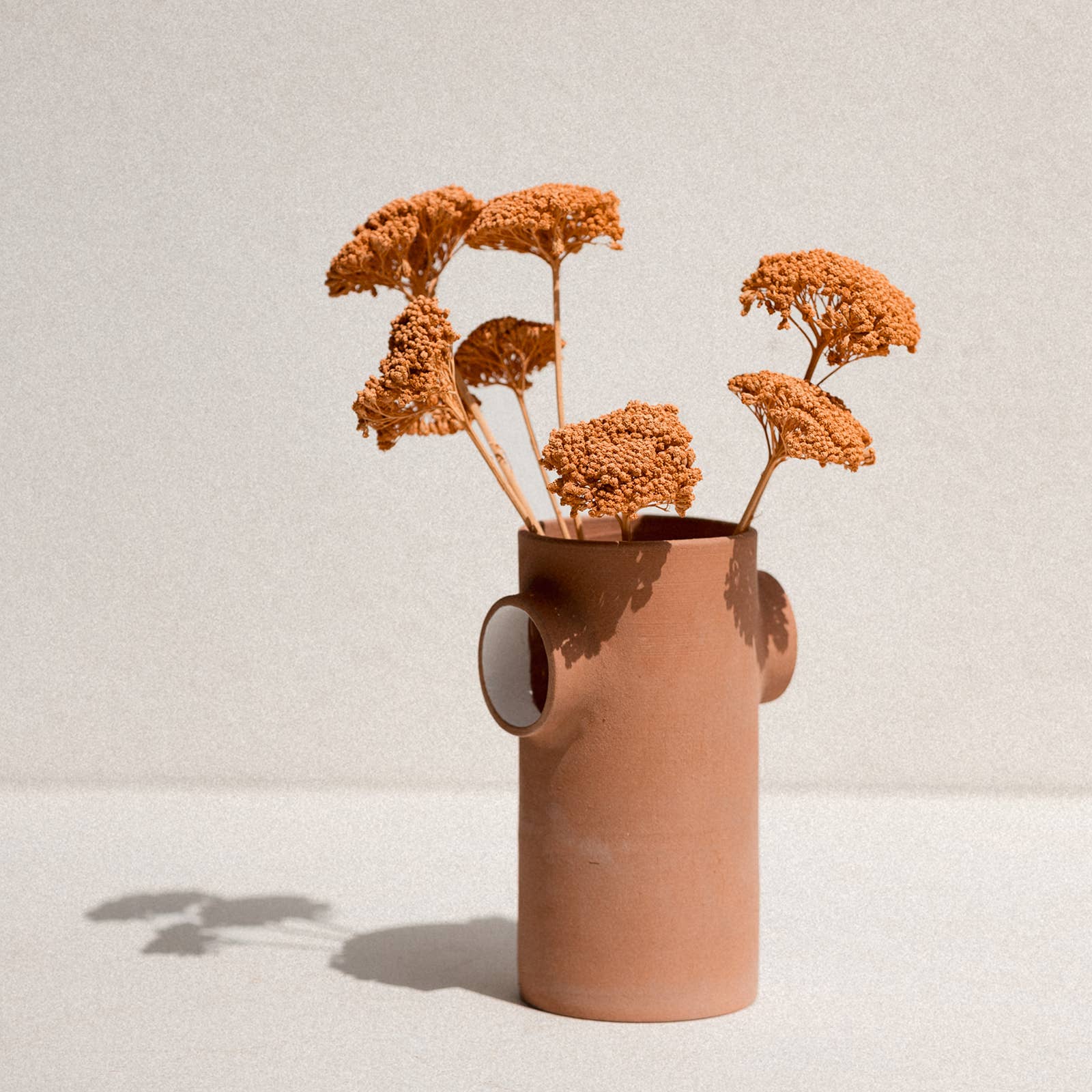 Handmade minimalist open terracotta ceramic vase