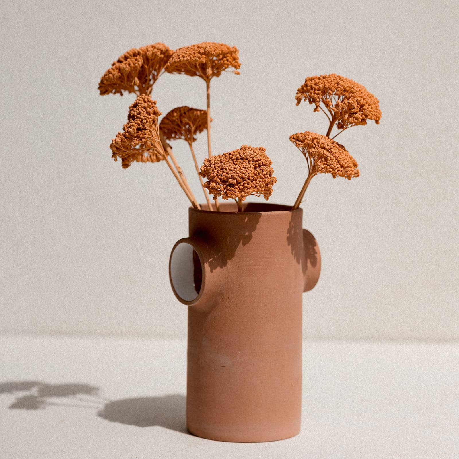 Handmade minimalist open terracotta ceramic vase